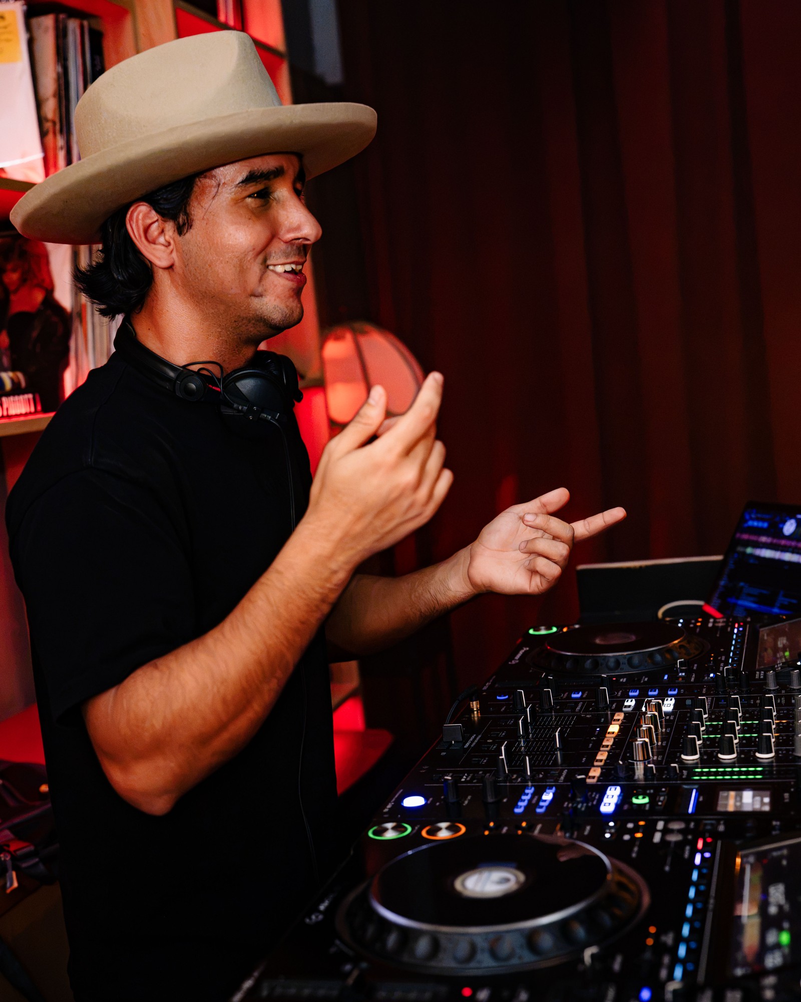 MayorJox performing behind DJ decks